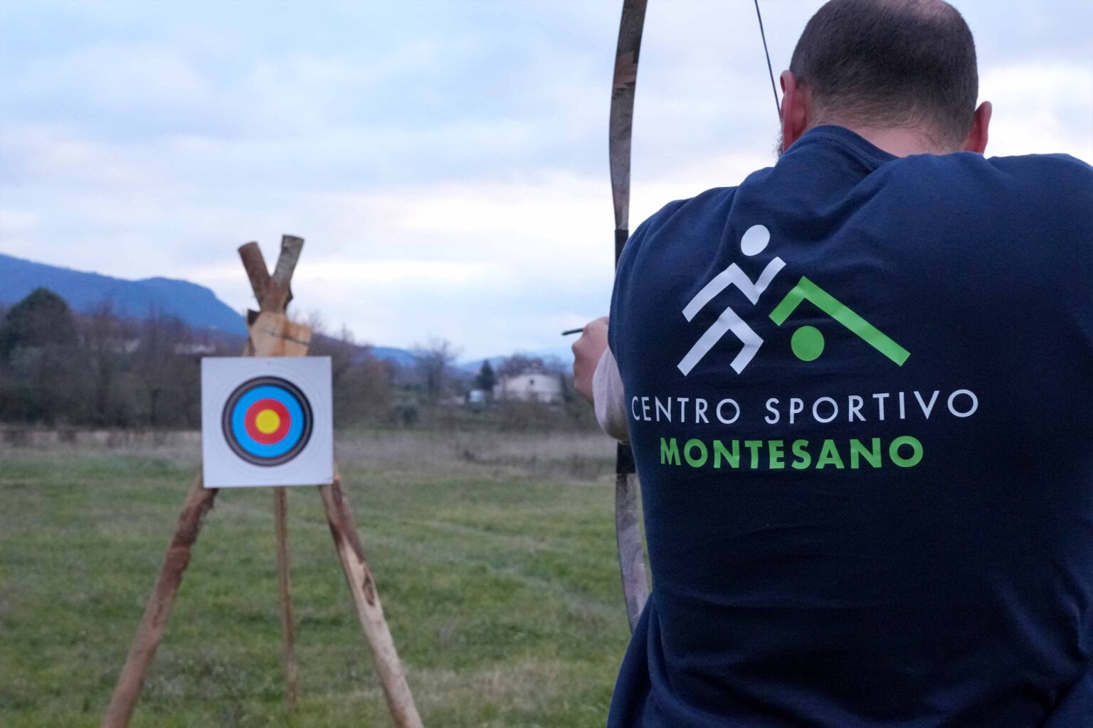 Woman on a horseback. Rider in a black uniform